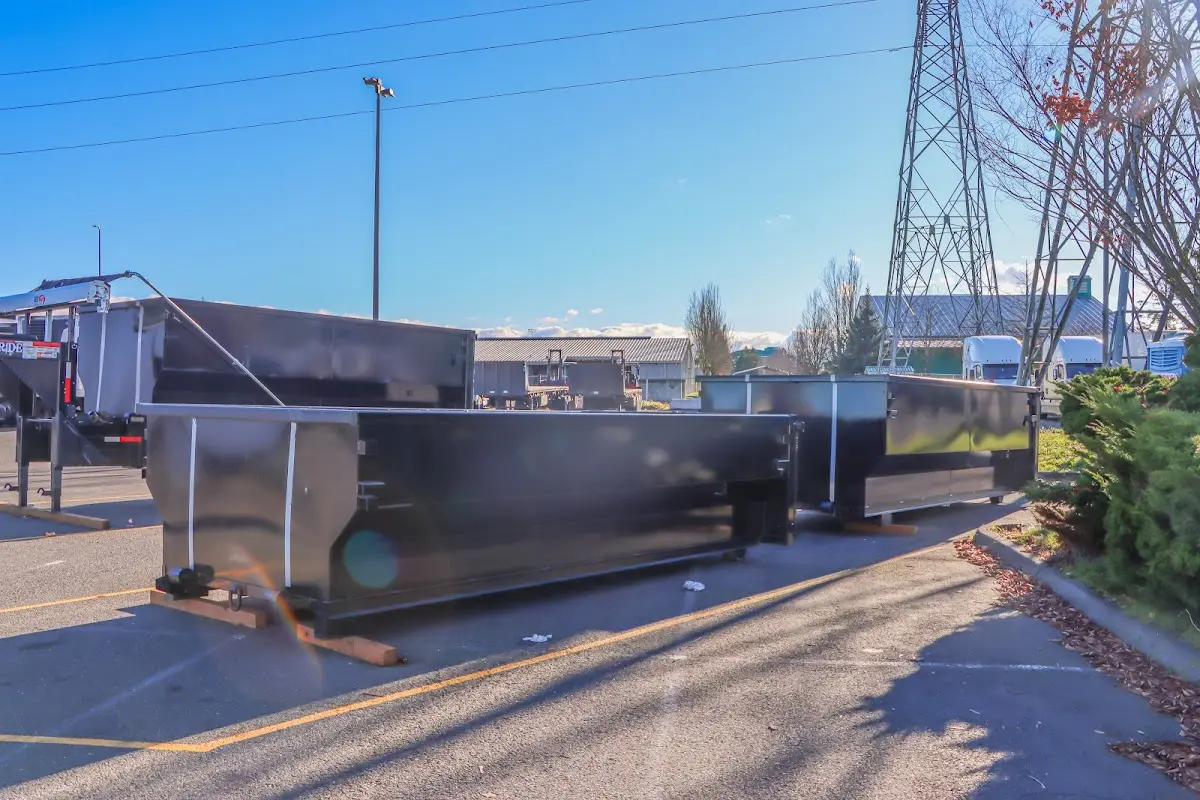 Roll-off dumpster ready for waste disposal at job site for 2 Yard Dumpster Rental in Kingston